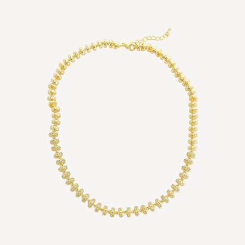 Gold necklace on a white background