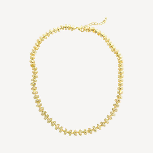 Gold necklace on a white background